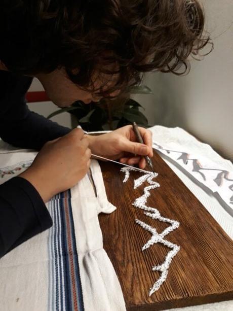 Castle string art: threading the mountains in the background