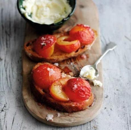 Baked plums on toast with mascarpone and lemon