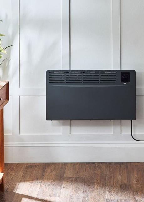 ecoso elio electric heater on a panelled wall