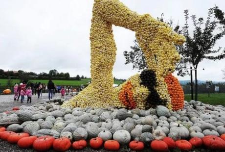 Swimmer installation made of pumpkins