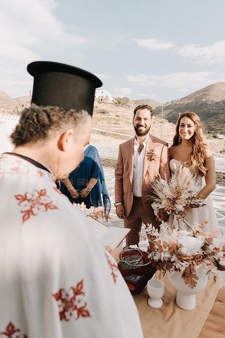 Destination wedding in Kythnos with rust terracotta shades | Nefeli & Michalis