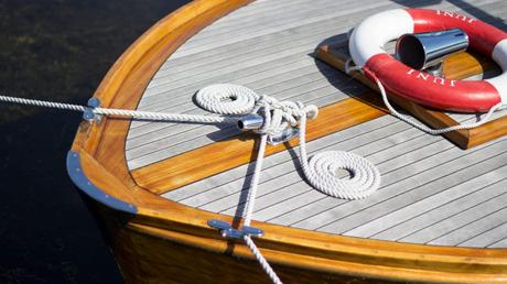 painting of wooden hulls on historic boats