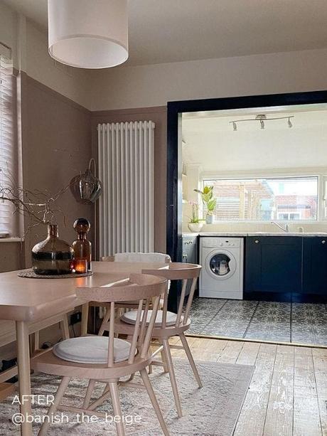 Milano Windsor white vertical radiator on brown wall in modern dining room