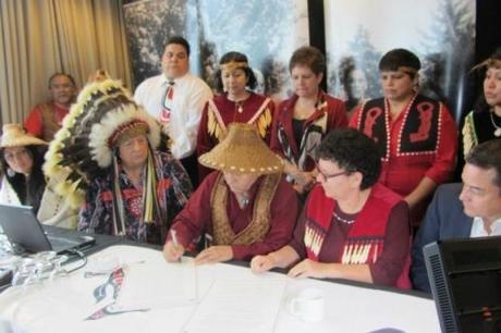 Chief Phil Lane Jr. (left) participates in the Vancouver signing of the International Treaty to Protect the Sacred From Tar Sands Projects. Photo courtesy of Phil Lane Jr.