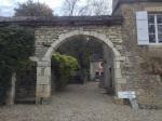 The archway into D. du Meix Foulot, located in the hillsides of the wine village of Mercurey in Burgundy's Côte Chalonnais.   | Image: L.M. Archer©2013