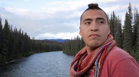 Caleb Behn along the proposed Enbridge pipeline route at the Morice River in Houston British Columbia. (Photo: Rebecca Carter)