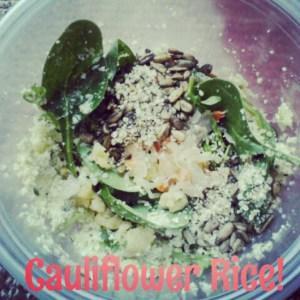 WIAW: Eat Yo Veggies Superfood salad for lunch featuring cilantro lime cauliflower rice. Base of spinach+arugula, with cauliflower rice, hemp hearts, spicy sprouted sunflower seeds, Farmhouse Culture raw jalapeno kraut and a little raw taco filling.