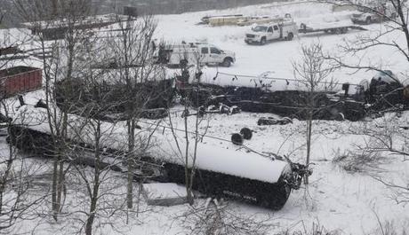 The wreckage of a train derailment is seen in the snow near Vandergrift, Pennsylvania February 13, 2014.  Credit: Reuters/Jason Cohn