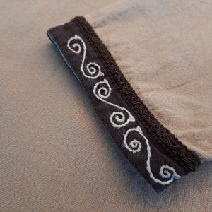 The embroidered cuffs on Locutus's Celtic tunic