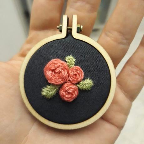 Embroidered rose pendant