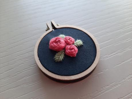 Embroidered rose pendant