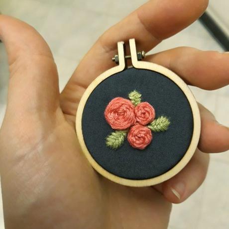 Embroidered rose pendant