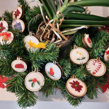 Embroidered Christmas ornaments: holly, poinsettia, candles, candy cones, bells...