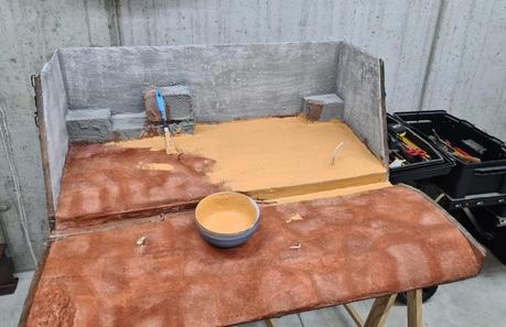 A Nativity diorama inside an antique steamer trunk (part 2, crafting the terrain) Painting the terrain for our Christmas nativity diorama inside the steamer trunk