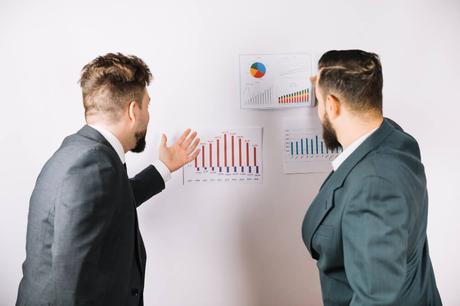 Creating an Effective MSP Business Plan Tow Businessman check a business Competitive Analysis