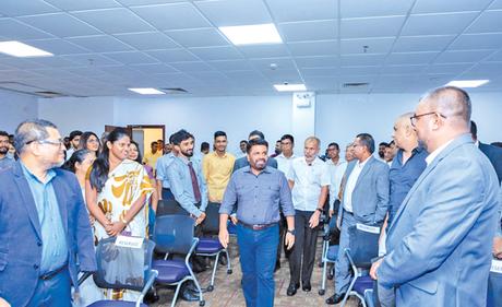 The President with the Digital Economic Affairs Ministry officials.  