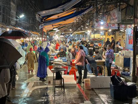 Rainy nighttime scene at Keelung fish market