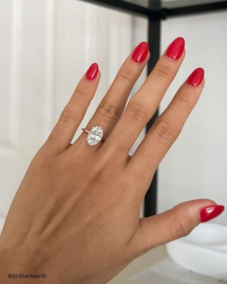 The Heart of an Ethical Promise: More Than Just a Ring ethical engagement rings simple yellow gold ring oval cut diamond ring brilliantearth