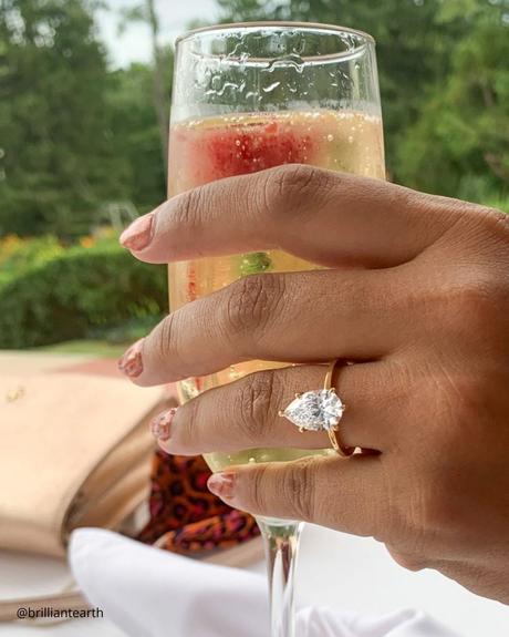 The Heart of an Ethical Promise: More Than Just a Ring ethical engagement rings yellow gold ring with pear cut diamond brilliantearth