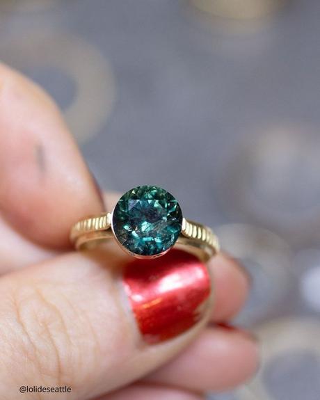 The Heart of an Ethical Promise: More Than Just a Ring ethical engagement rings vintage ring with round cut sapphire in the center lolideseattle