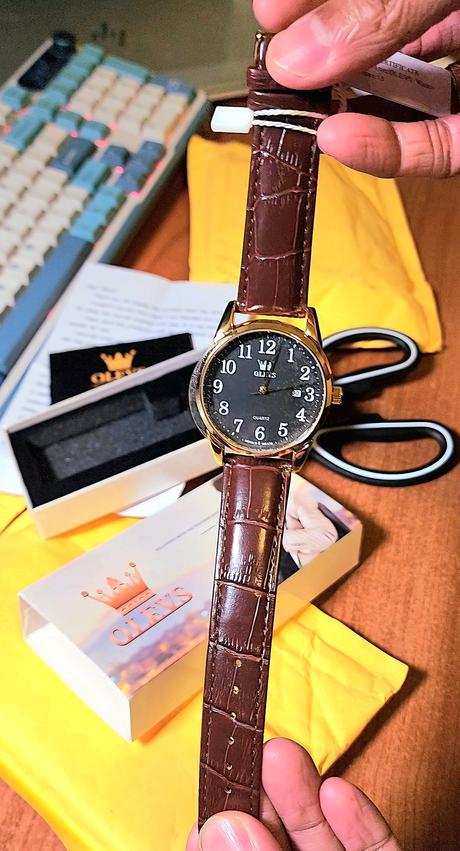 Unboxing and Review: OLEVS Quartz Waterproof Watches for Men OLEVS watch unboxing, OLEVS Quartz Waterproof Watch review, affordable men's watches, OLEVS stainless steel watch, gold leather strap watch, best budget watches for men, stylish watches under PHP600, OLEVS original watch review, quartz movement watches, multifunctional watch features, elegant men's watches, unboxing affordable luxury watches, OLEVS watch for formal wear, waterproof men's watches, durable watches review, watch unboxing and review, affordable timepieces for men, OLEVS watch packaging, high-quality men's watches, wristwatch for gifting ideas, OLEVS 5567 model watch, men's watches with calendar, lightweight watches for daily use, stainless steel strap watch review, gold watch with leather strap, watches for outdoor sports, OLEVS watch for business wear, stylish and functional watches, OLEVS watch durability test, quartz watches under PHP1000.