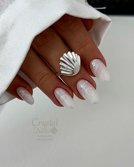 milky white nails marble design with silver nailcocktail