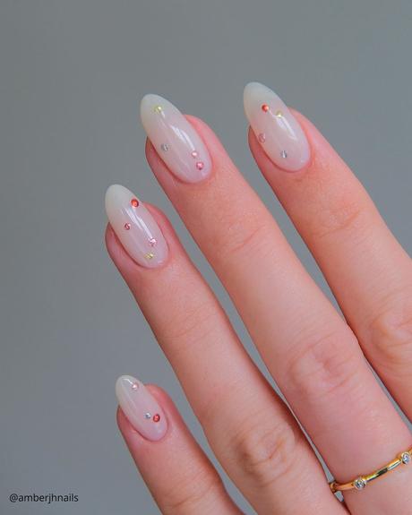 milky white nails minimalistic colorful rhinestones amberjhnails