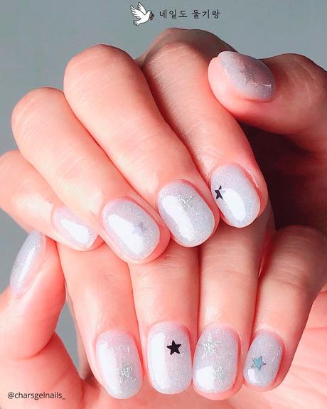 milky white nails short sparkling with stars doolginail