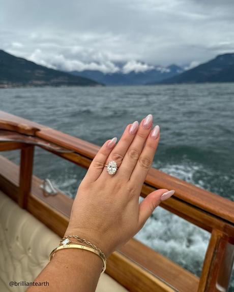 ethical engagement rings yellow gold ring heart shaped ruby doamore girl on the yacht shows her diamond ring brilliantearth