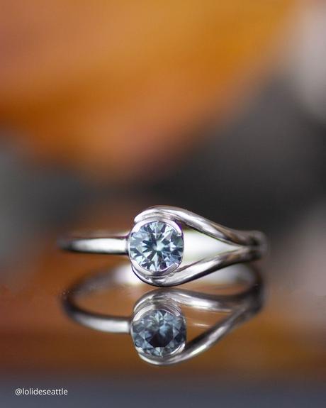 ethical engagement rings platinum ring with small blue round cut diamond lolideseattle