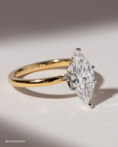 ethical engagement rings yellow gold ring with marquise cut center stone brilliantearth