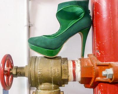 Claude 3.5 Sonata describes the infamous green pump astride a fire hose valve. Hot Hot Hot!