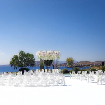 Seaside wedding with white blooms and gold accents | Eleni & Jordan