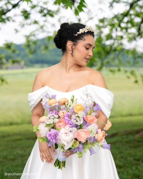 Enchanting Spring Wedding Bouquets: From Classic to Contemporary spring wedding bouquets brunette bride in a garden with white lilac and pink bridal bouquet southern blooms