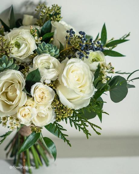 Enchanting Spring Wedding Bouquets: From Classic to Contemporary spring wedding bouquets rustic bouwuet with greenery and succulents