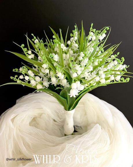 The Ultimate Guide to Using Fake Flowers for Your Wedding fake flowers fake small bouquet of lilly of the valley