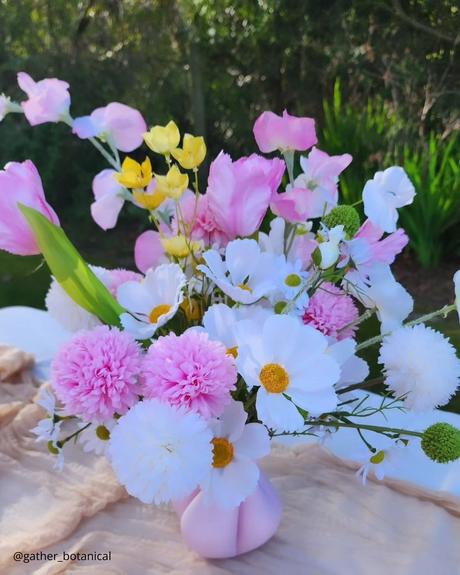 The Ultimate Guide to Using Fake Flowers for Your Wedding fake flowers mix of real and fake field flowers in vase gather botanical