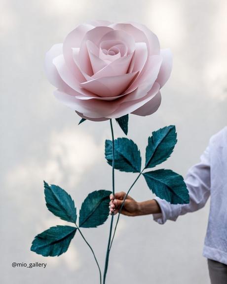 The Ultimate Guide to Using Fake Flowers for Your Wedding fake flowers huge fake rose in hand mio gallery