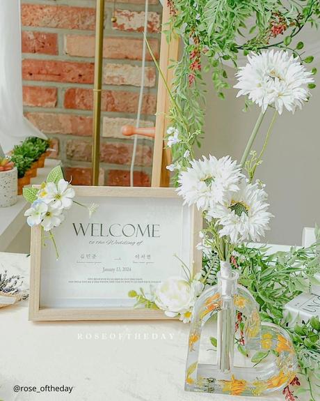 The Ultimate Guide to Using Fake Flowers for Your Wedding fake flowers the table decor flowers in epoxy resip and froto frame