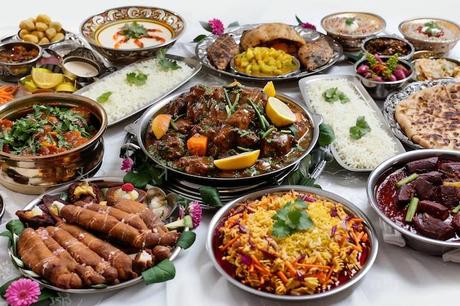 Wazwan feast with multiple Kashmiri dishes served