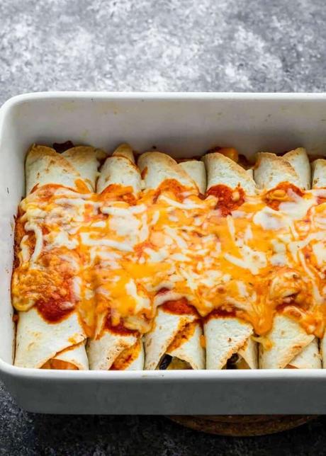 Vegetarian Enchiladas a casserole dish fill of enchiladas