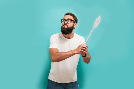 Picture of man trying to do his own pest control in Baton Rouge.