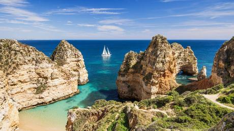 Our 4 Favorite Europe Destination Pairings Bay near Lagos town, Algarve region, Portugal