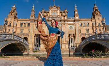 Our 4 Favorite Europe Destination Pairings Typical Spanish woman dancing flamenco in Seville, Andalusia, Spain.-min