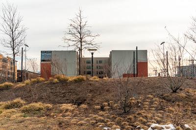 A gloomy Sunday afternoon with the sun high in the sky (behind clouds)