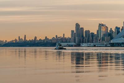 Reflections of the sun one morning in Hoboken along the Hudson