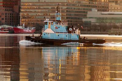 Reflections of the sun one morning in Hoboken along the Hudson
