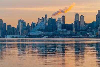 Reflections of the sun one morning in Hoboken along the Hudson
