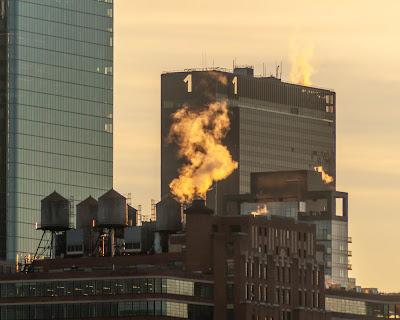 Reflections of the sun one morning in Hoboken along the Hudson