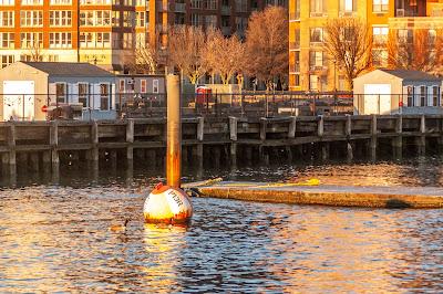 Reflections of the sun one morning in Hoboken along the Hudson
